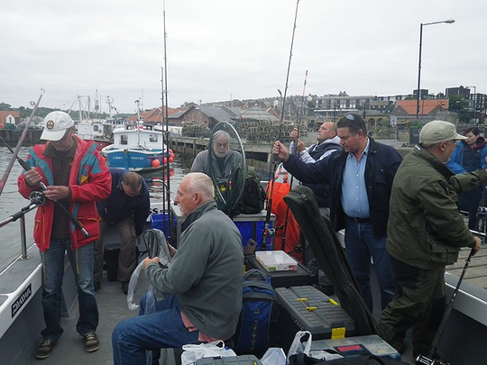 Busy anglers getting organised as Mistress leaves Whitby Harbour